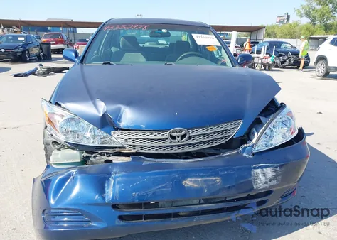 2004 Toyota Camry Le z USA, uszkodzony, nr VIN 4T1BE32K64U328933